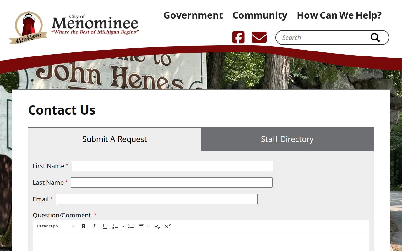 Menominee City Hall and staff page linked to Menominee warrant records